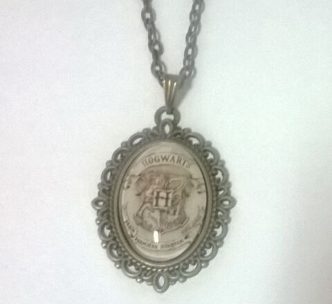 Брелок Harry Potter Hogwarts 4х3 см. - -