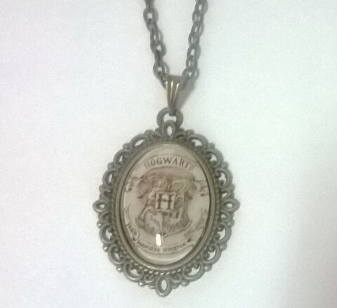 Брелок Harry Potter Hogwarts 4х3 см. - -