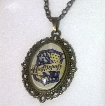 Брелок Harry Potter Hufflepuff 4х3 см. - -