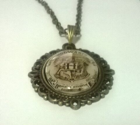 Медальйон Harry Potter Hogwarts 4х3 см. - -