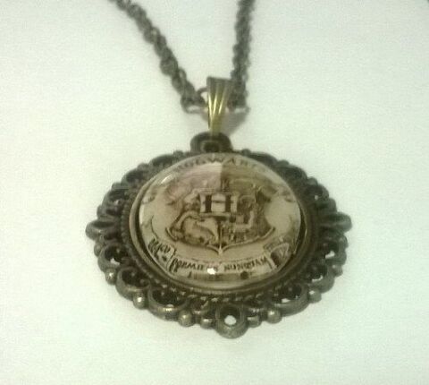 Медальйон Harry Potter Hogwarts 4х3 см. -   -  