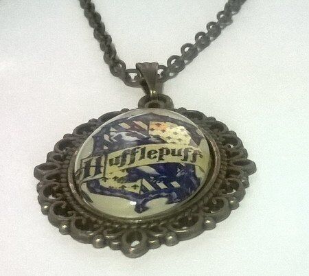 Медальйон Harry Potter Hufflepuff 4х3 см. - -